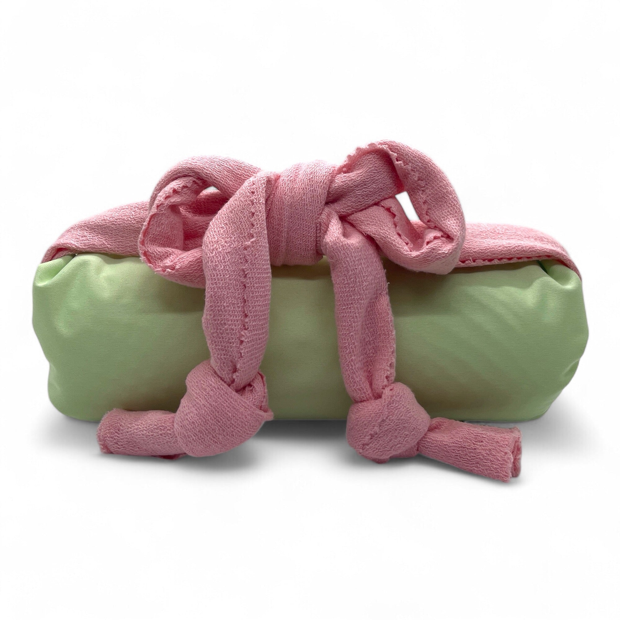 Basin Bliss neck support cushion for salon sink and home use, providing comfortable head and neck cushioning during hair washing.