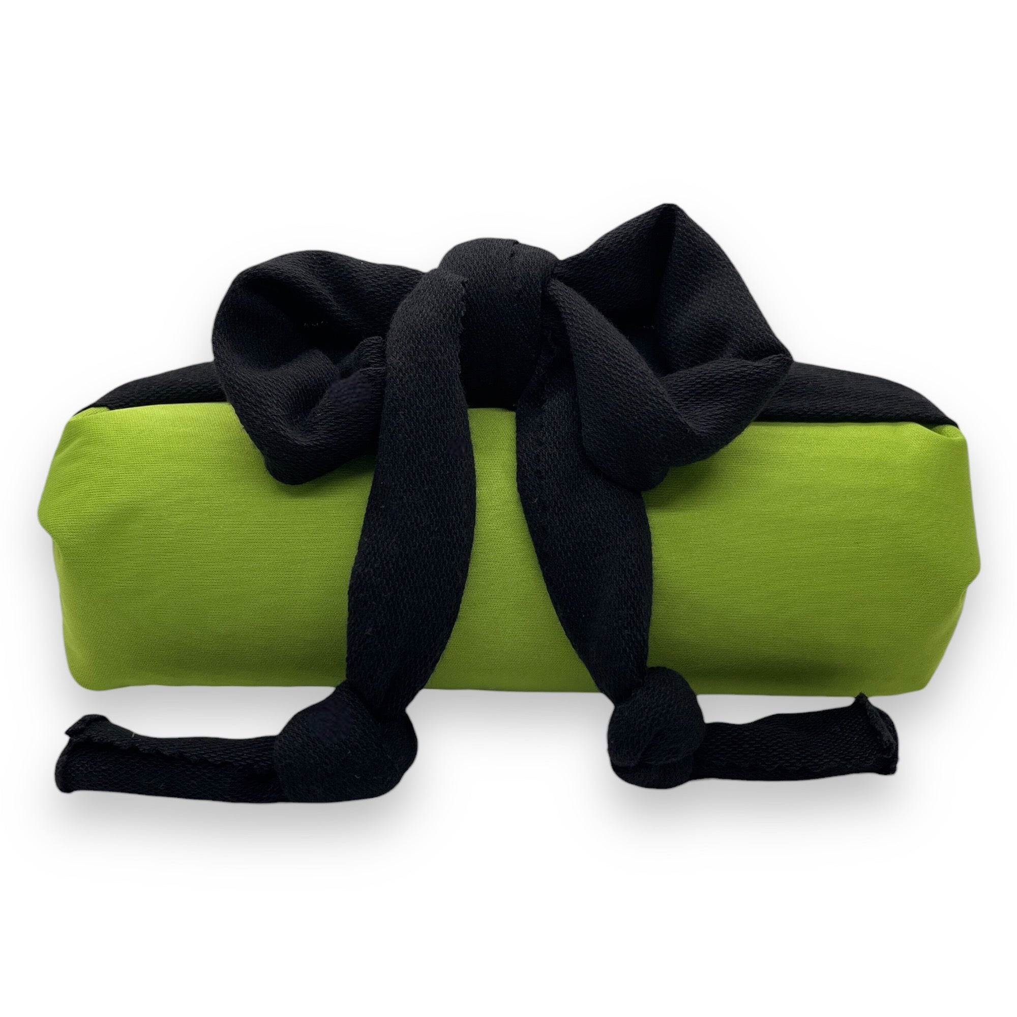 Basin Bliss neck support cushion resting on a salon sink or home bathroom, providing comfortable neck relief during hair washing.
